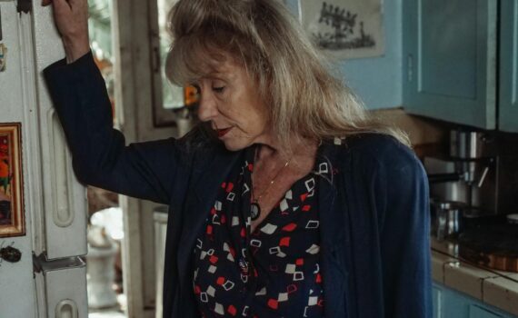 Woman in Black and Red Floral Shirt